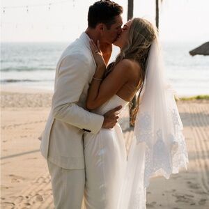 Cathedral lace trim wedding veil with blusher